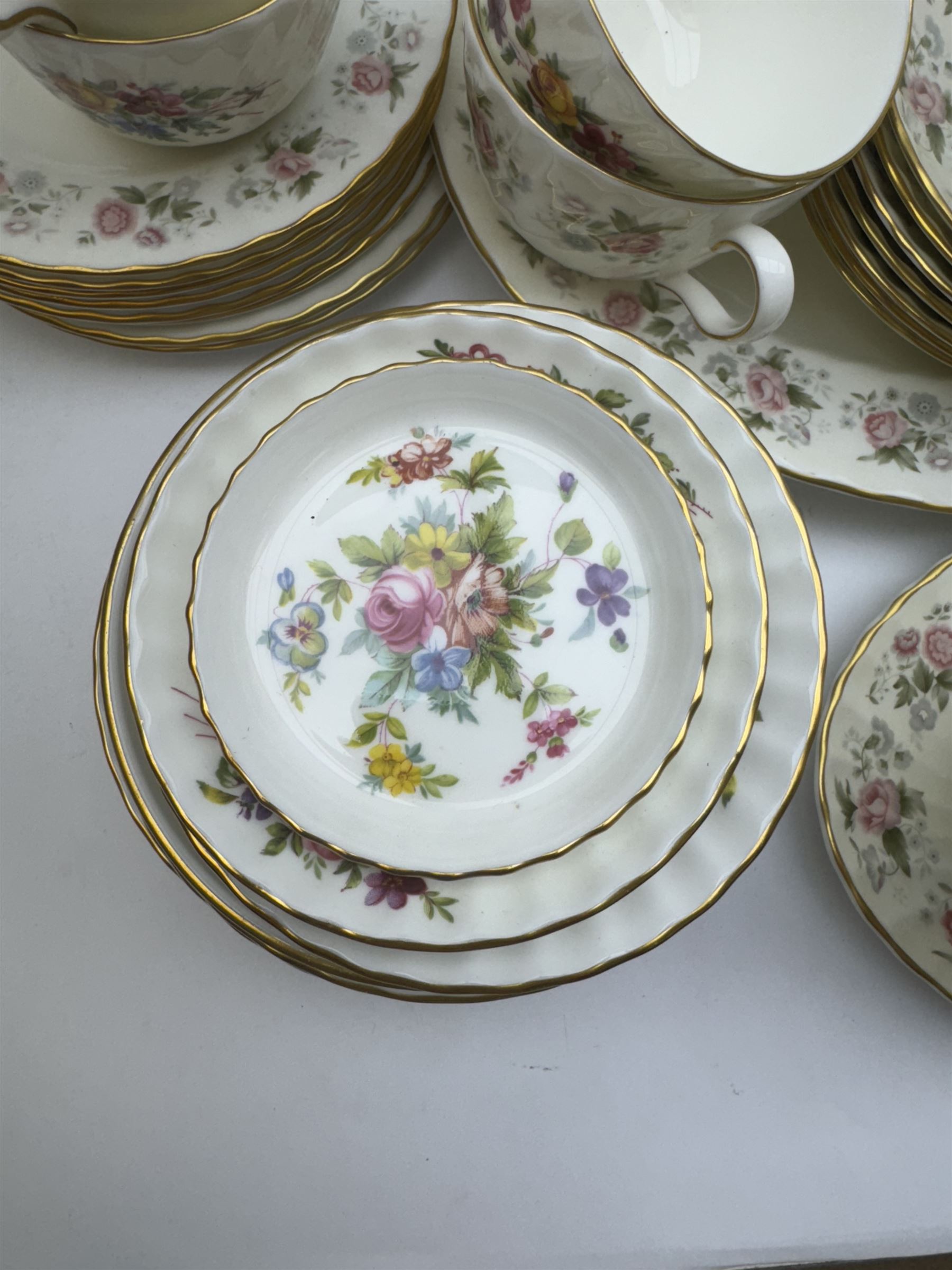 Minton Spring Bouquet pattern part tea and dinner service, including six dinner plates, six side plates, two covered dishes etc, together with Minton Marlow pattern part tea service  