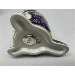 Three Royal Crown Derby paperweights, comprising Puffin with gold stopper and original box, Platypus with silver stopper and Penguin with missing stopper, all with printed marks beneath 
