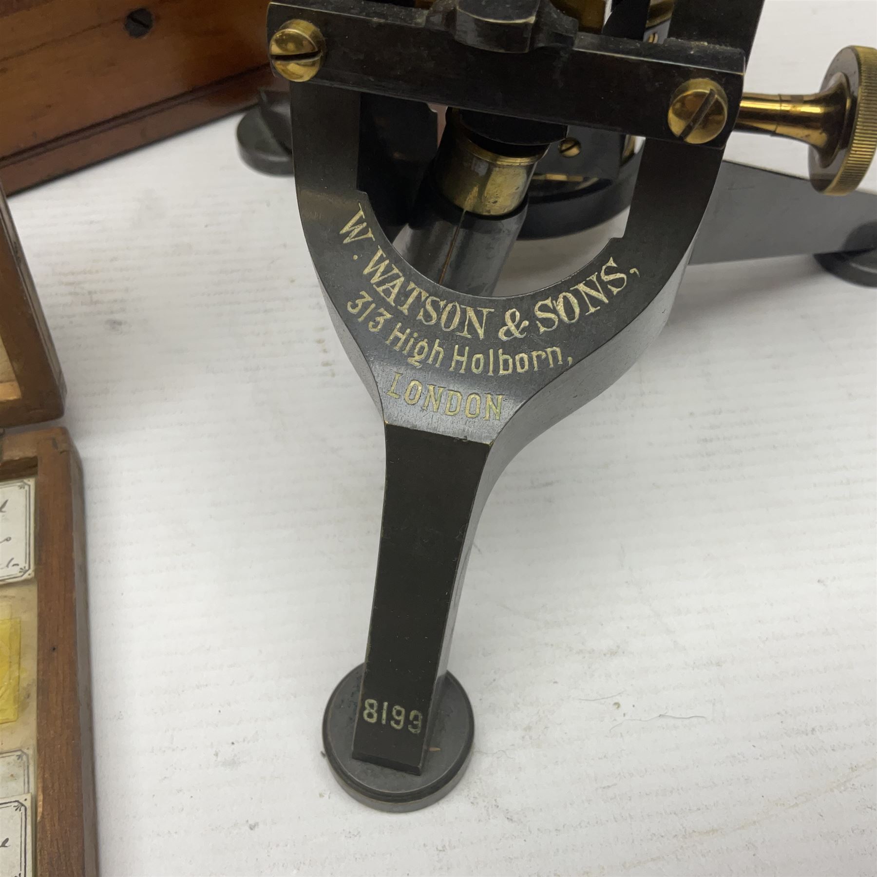 W. Watson & Sons Ltd lacquered brass compound microscope circa 1910, the back foot signed W. Watson & Sons Ltd, 313 High Holborn London and numbered 8193, together with a boxed collection of glass microscope biological sample slides