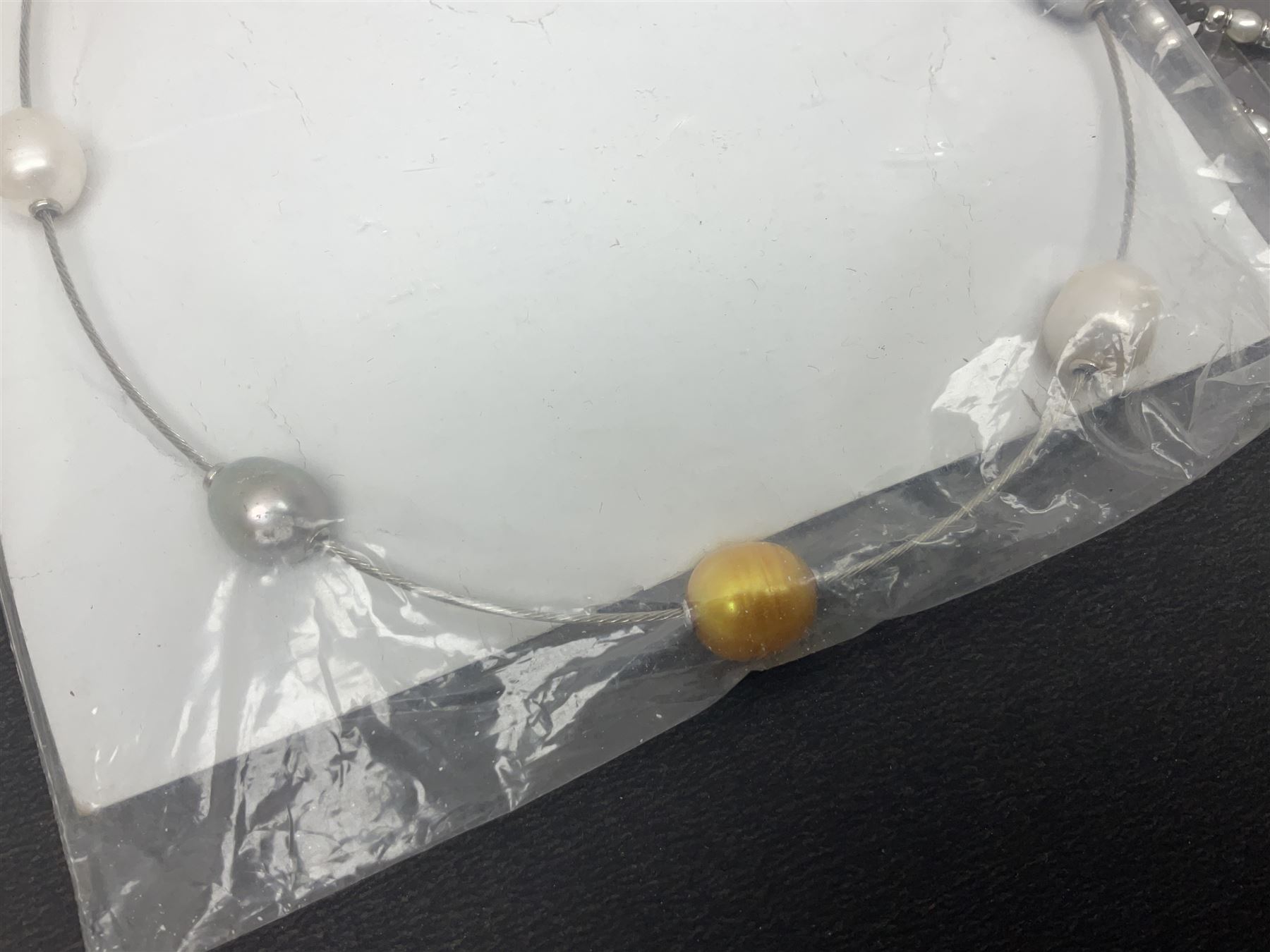 Fresh water pearl jewellery, including silver chain bracelet and necklace, and seven other necklaces, including agate examples, some with silver clasps