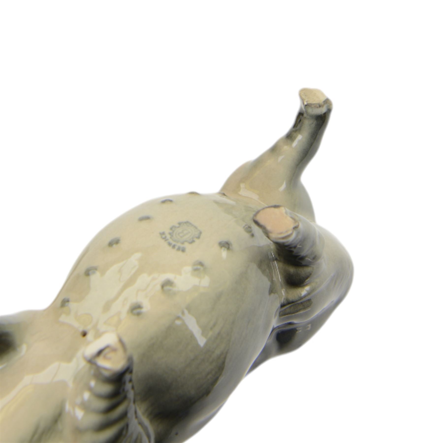 Three Beswick pigs, comprising Saddleback, Vietnamese and Berkshire Boar and a Wensleydale sheep 