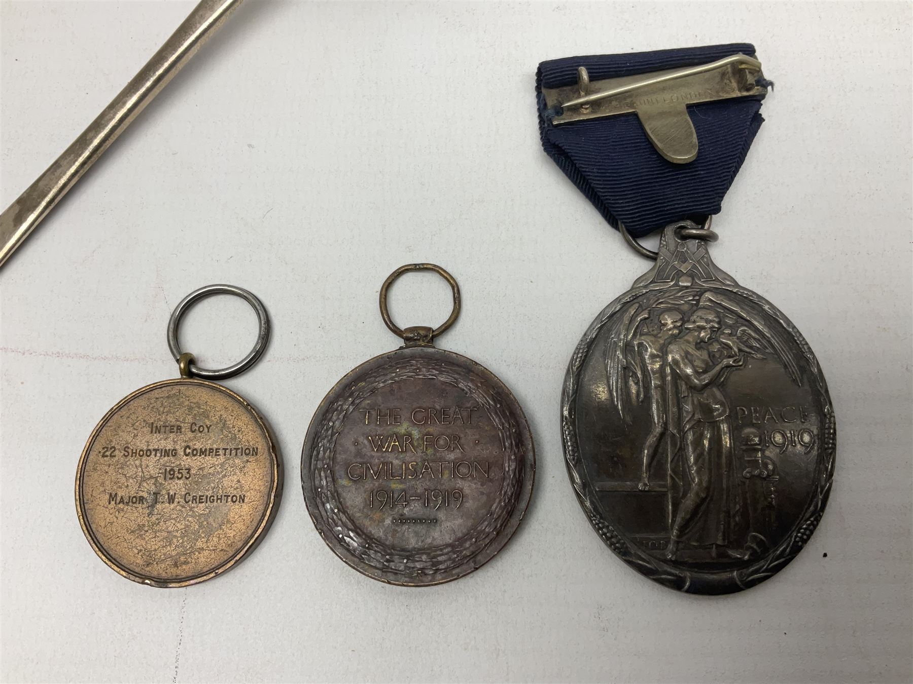 Two silver Georgian tablespoons, approximate total weight 3.36 ozt (104.7 grams), together with Great War Peace Medal 1919 and two others 