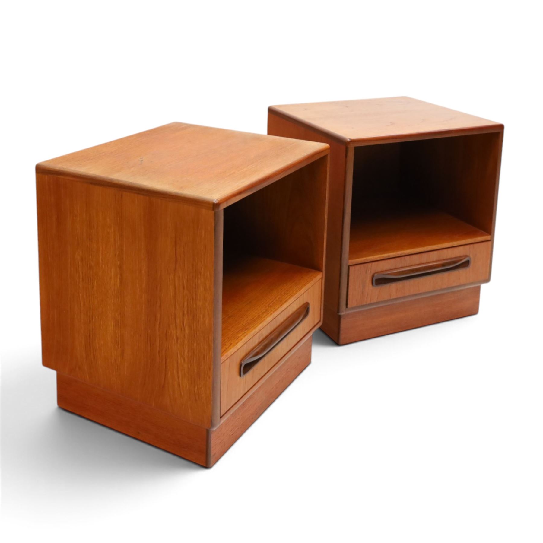 G-Plan - ‘Fresco’ teak pair of bedside cabinets, each with rectangular top over open recess and single drawer with sculpted handle, on plinth base