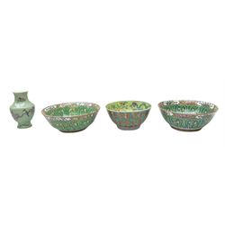 Pair mid 20th century Chinese Canton bowls, with butterfly and foliate decoration in enamels, one marked beneath Made in China, the other marked Canton, H11cm D30cm, together with a 20th century Chinese celadon type vase, decorated with enamels with bird upon a flowering branch, H20cm, and a 20th century bowl decorated with characters to the exterior and dragons, butterflies and flowers to the interior, H12cm D24.5cm