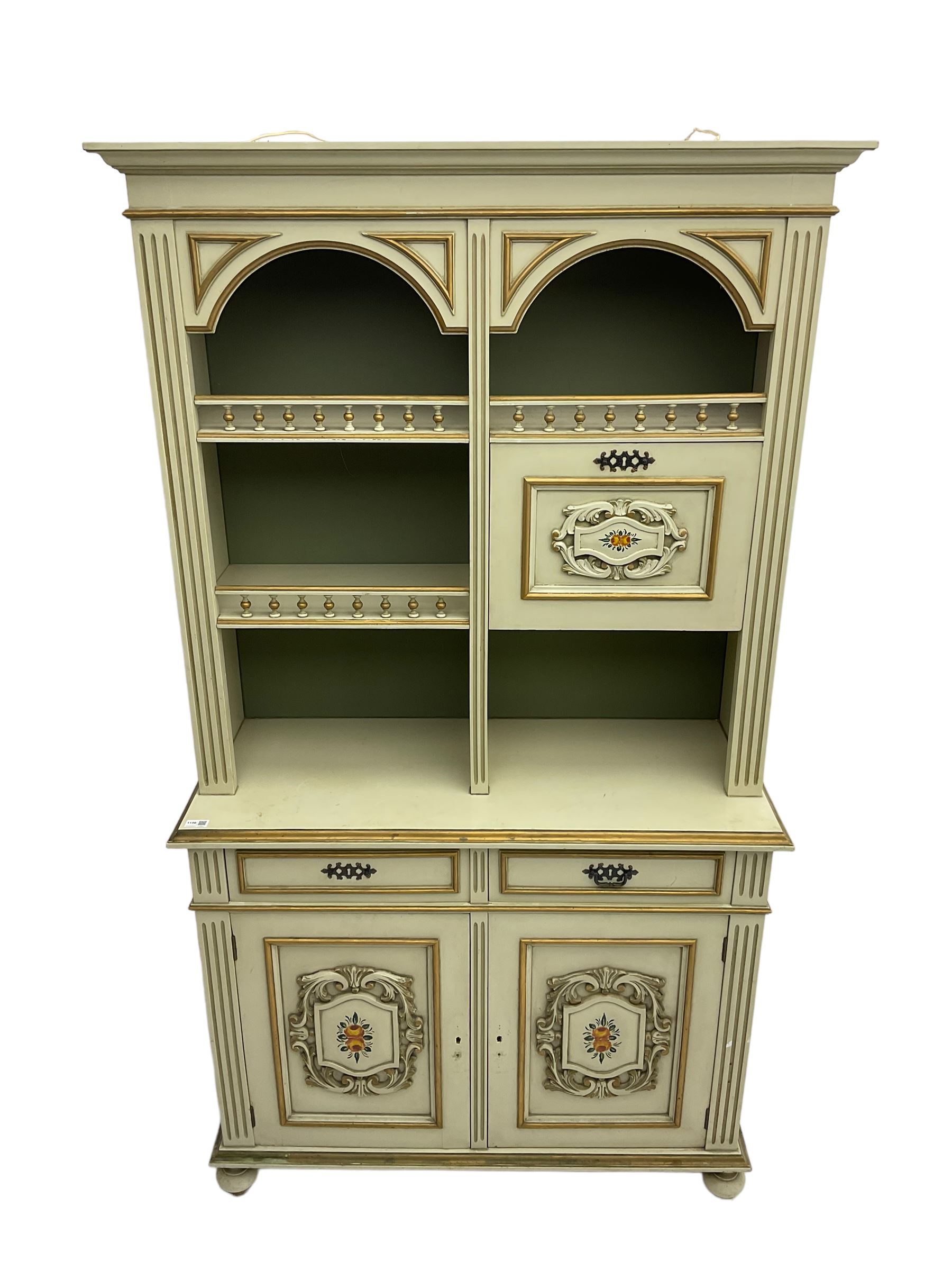 Portuguese painted dresser, two-tier plate rack with spindle gallery and fall-front cupboard, flanked by fluted uprights, fitted with two drawers over two cupboards, the panelled cupboards with floral decoration and a rinceaux border, white painted and parcel-gilt 