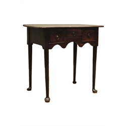  Queen Anne style oak lowboy, rounded rectangular top above two deep and one shallow drawers, shaped apron, turned supports with pad feet, brass ring and circular plate handles, W76cm, H75cm, D49cm  
