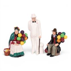 Three Royal Doulton figures, comprising  Churchill HN3057, The Old Balloon Seller HN1315 a...