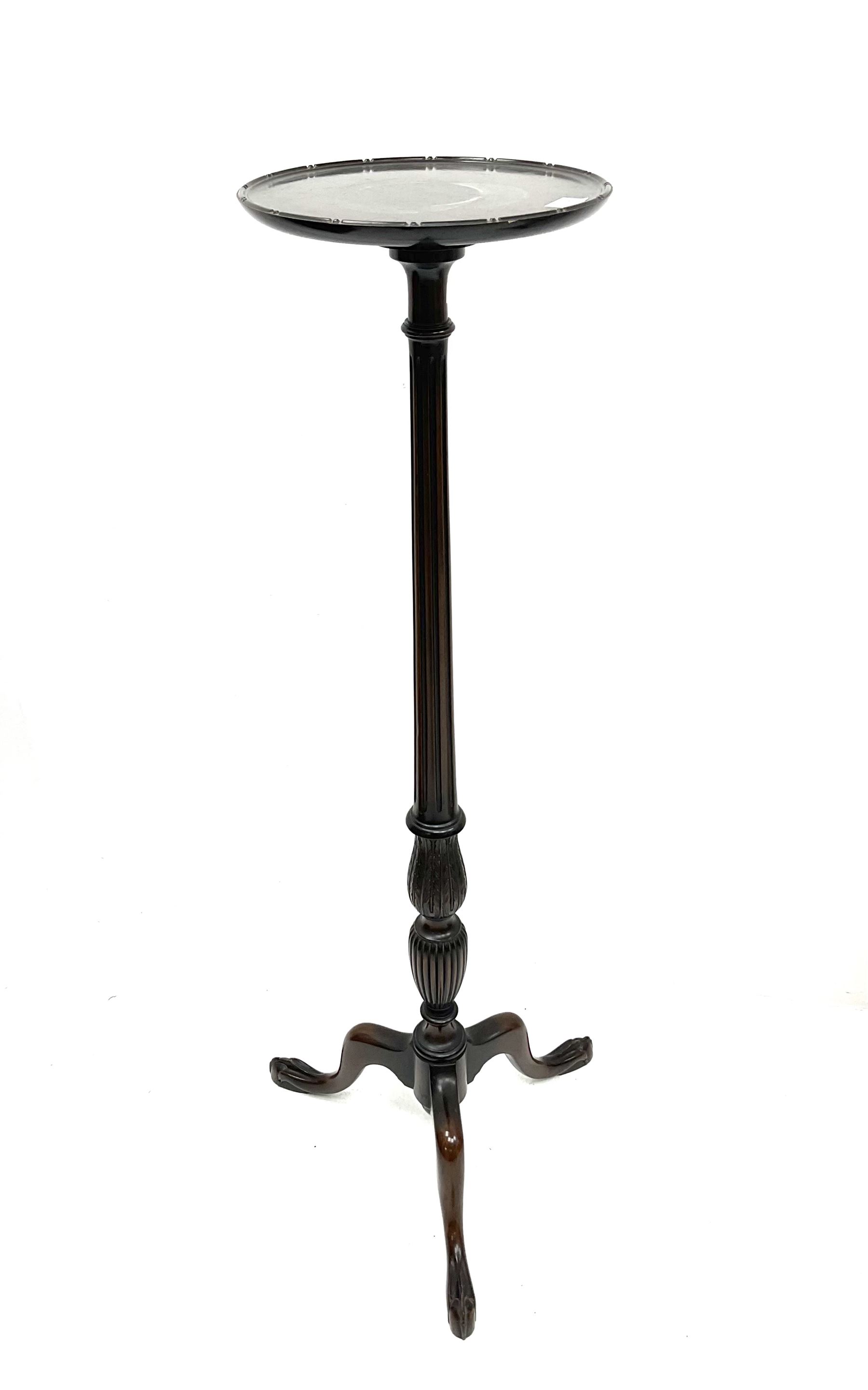 Early 20th century mahogany plant stand, carved central column, raised on three cabriole supports 