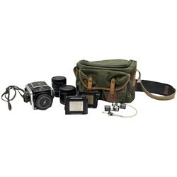 Zenza Bronica S2A medium format camera body, with Nikkor-P '1:2.8 f-75mm' lens, Zenza Bronica Zenzanon MC '1:3.5 f-150mm lens, Zenza Bronica Tele-Converter-E 2x, and two additional film cases. in a Billingham camera bag