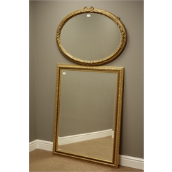  Early 20th century oval bevelled mirror in gilt frame moulded with ribbons (91cm x 68cm), and a rectangular bevelled mirror (89cm x 116cm)  