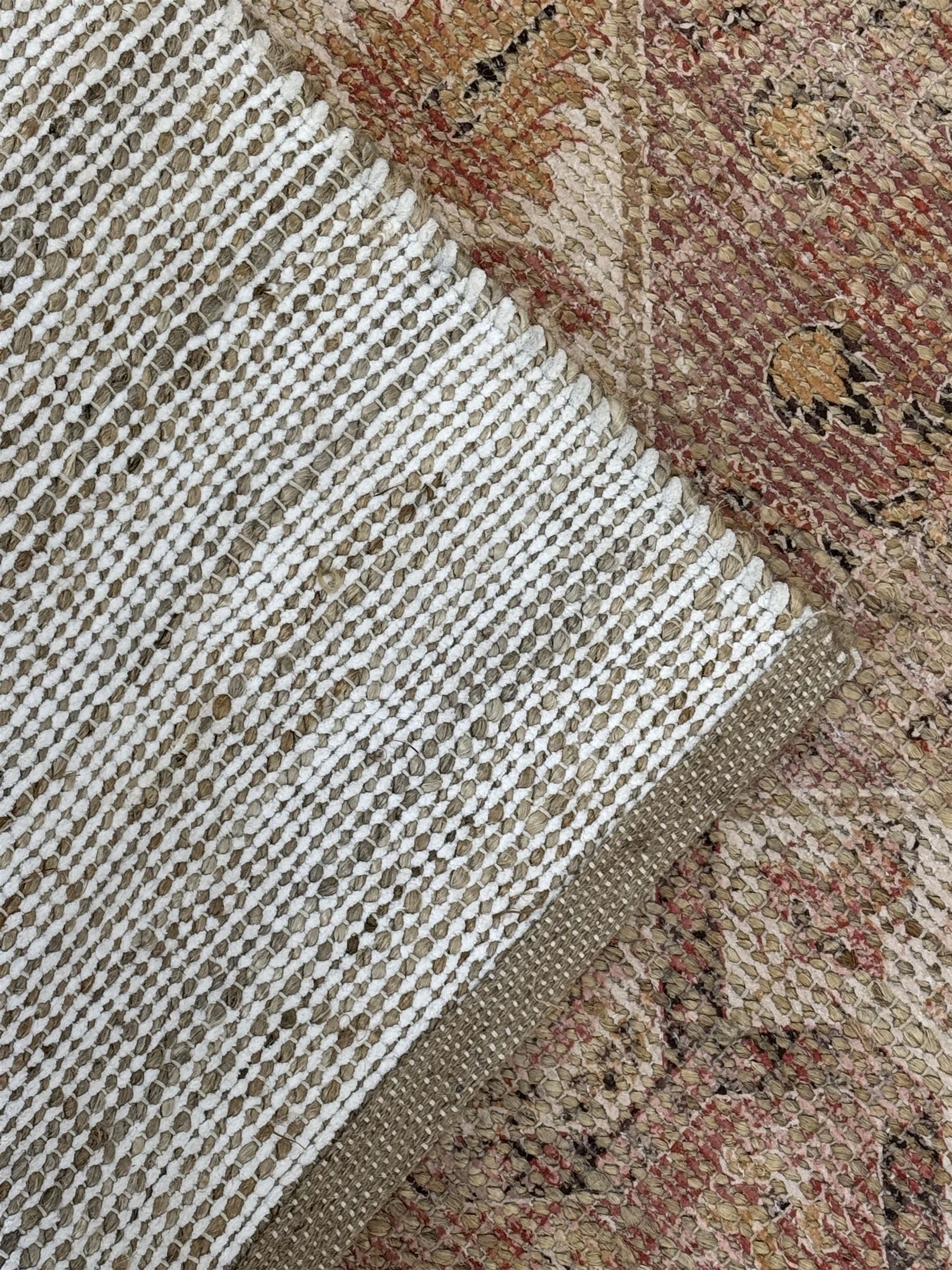 Contemporary Dunelm dua jute traditional rug, handcrafted from a blend of jute, polyester and cotton, featuring a red-toned design with a textured weave