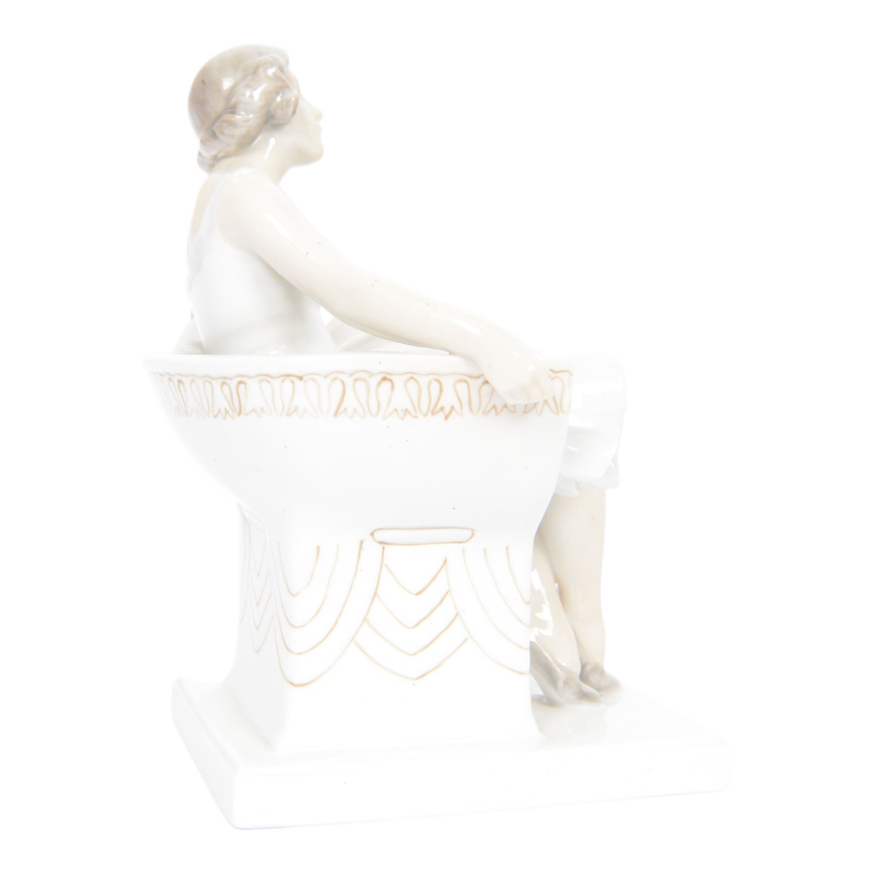 Royal Copenhagen figure no. 894, Woman Seated in a Chair, designed by Axel Locher, H20cm
