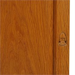 Knightman - Yorkshire oak dresser, the upper section fitted with two drawers flanked by two hutch cupboards, rectangular top over three drawers and fielded panelled cupboard, on skirted base, carved with knight signature, by Horcace Knight of Thirsk