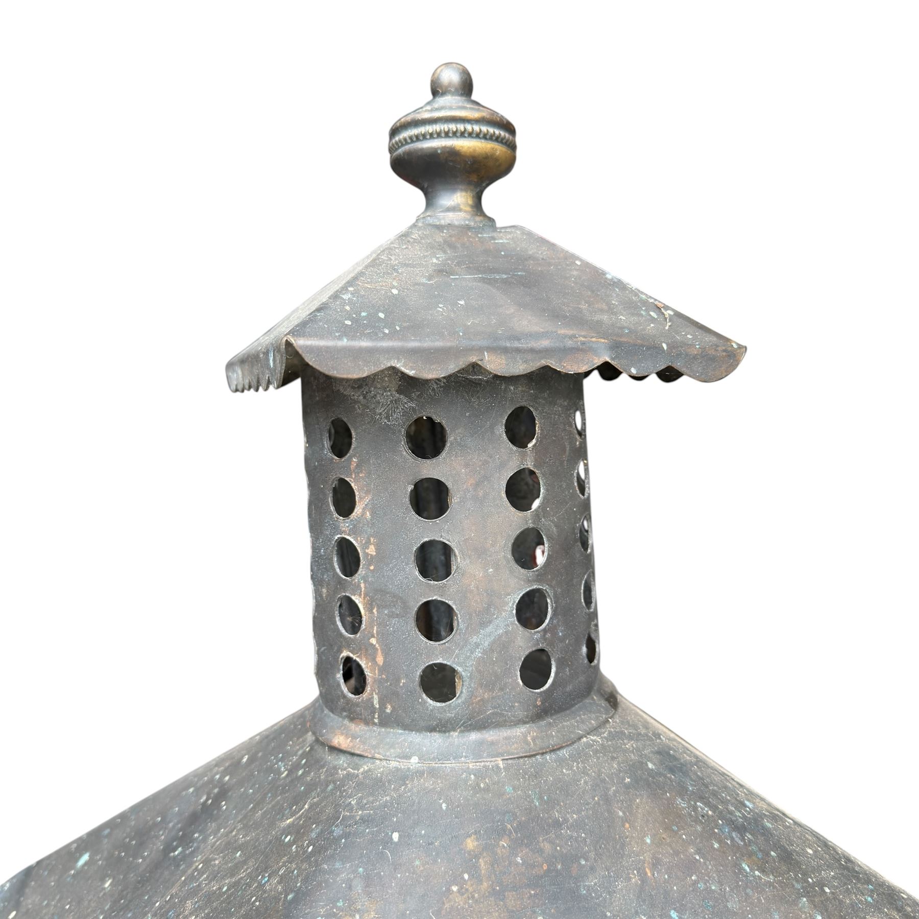Early 20th century brass and cast iron garden lantern or street light, turned finial over four panel glazed body, cast iron base