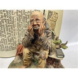 Four Capodimonte figure groups, to include tramp figures, shoemaker figure etc