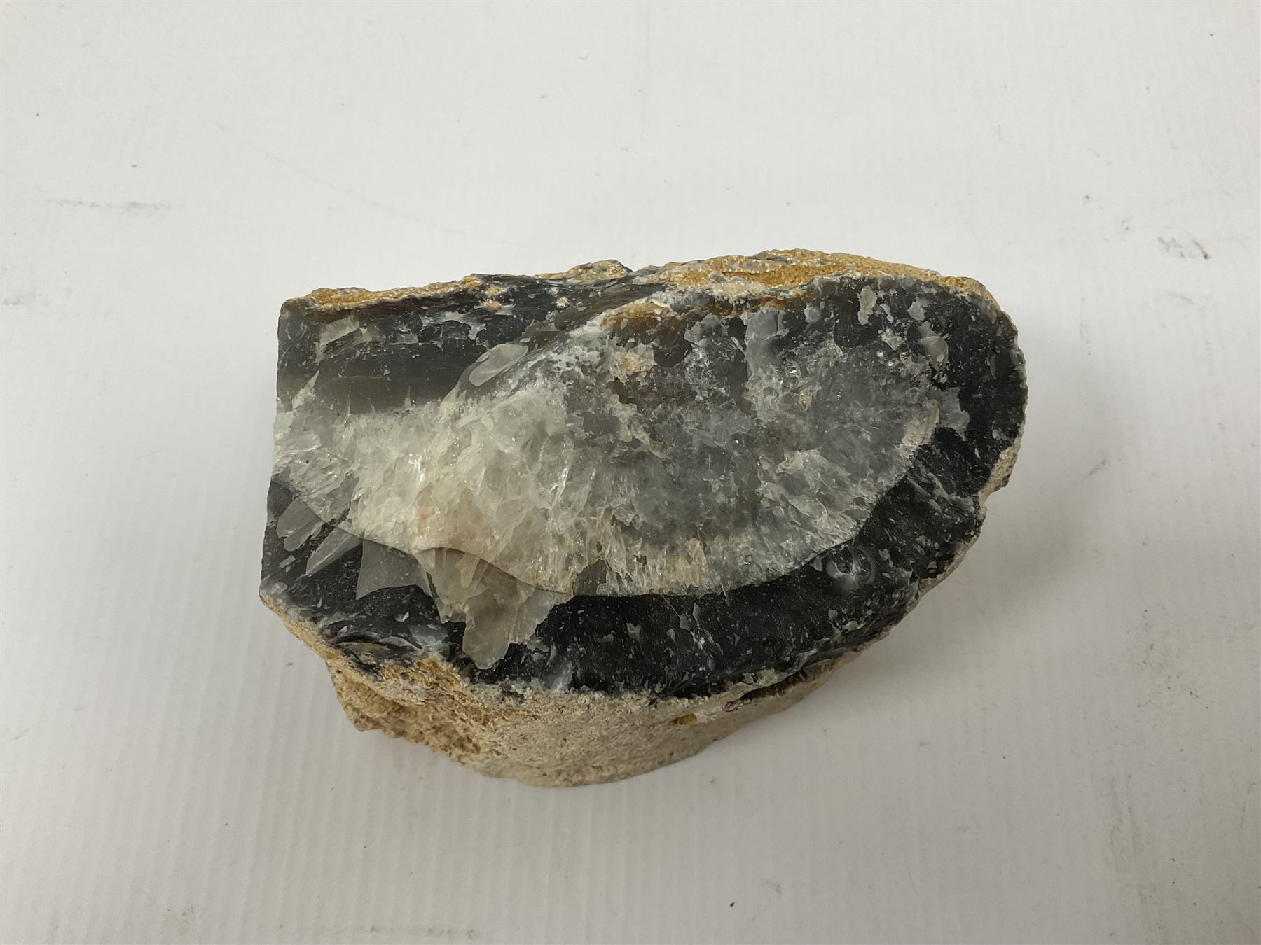 Four polished blue agate geodes, largest H10cm, L18cm