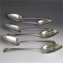 Six Georgian silver Old English pattern table spoons, all engraved with initials, includin...
