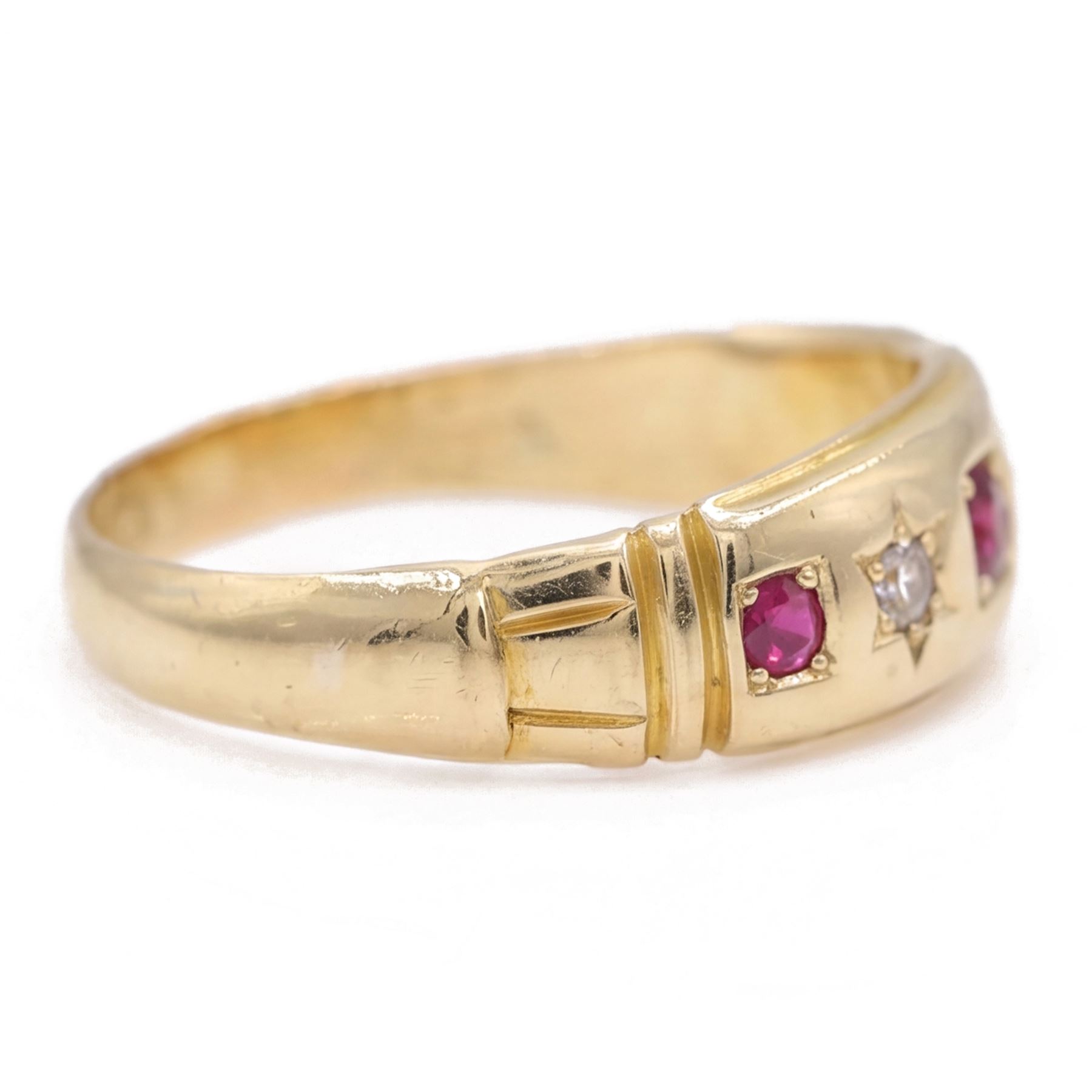 Victorian gold ruby and diamond gypsy ring, three round cut rubies spaced by two star set round cut diamonds, stamped 18ct