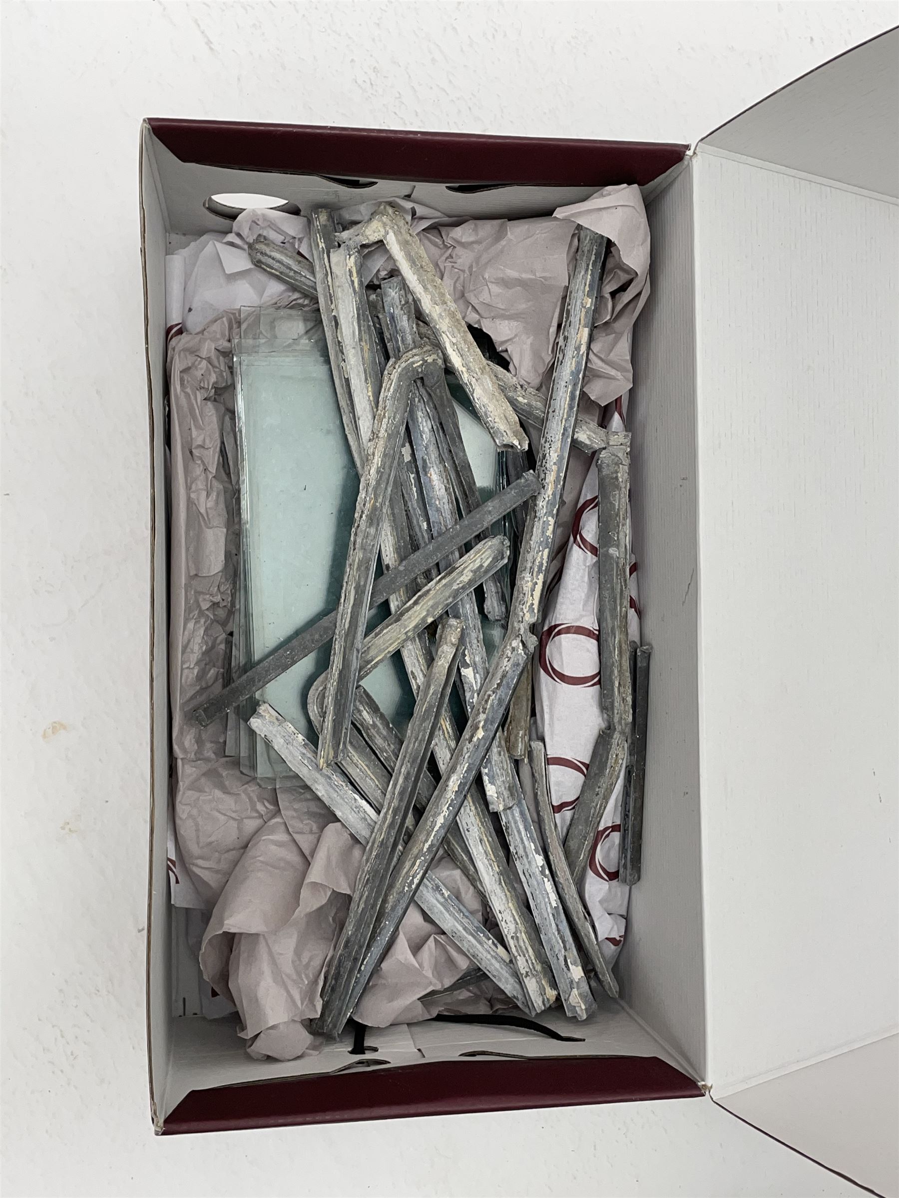 Collection of stained and leaded glass windows and panes, stylised floral design, various sizes, the largest window measuring 55cm x 112cm (including wooden frame)