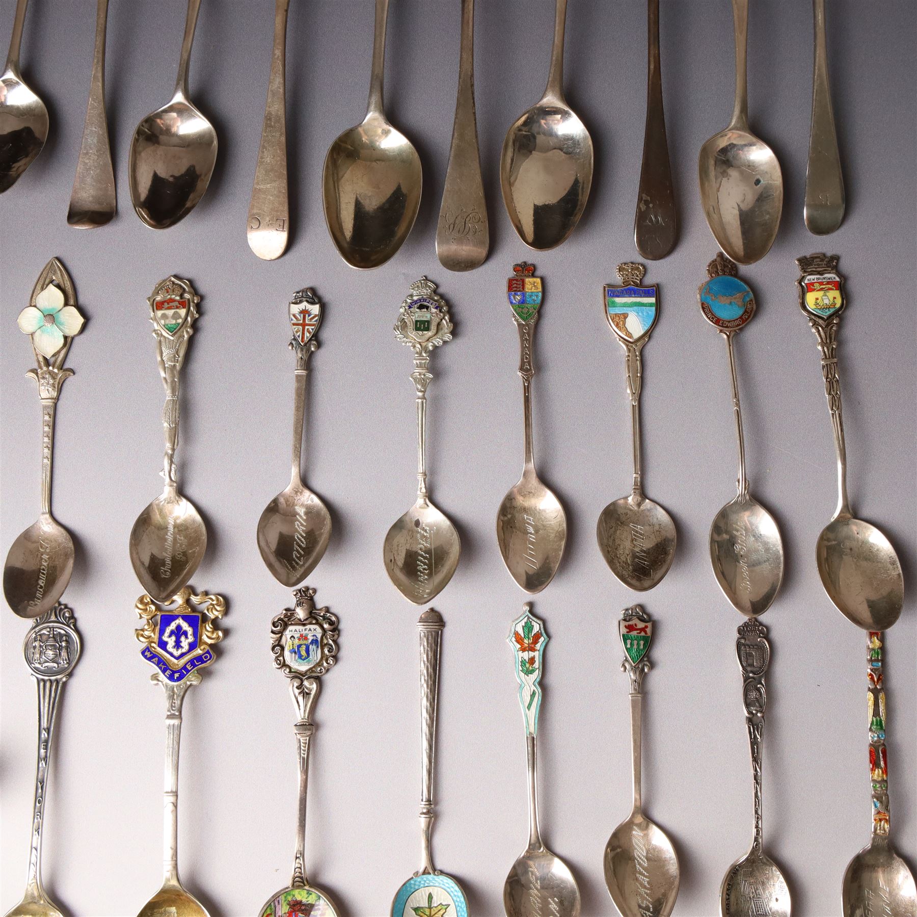 Collection of assorted silver teaspoons, souvenir spoons with enamel decoration etc