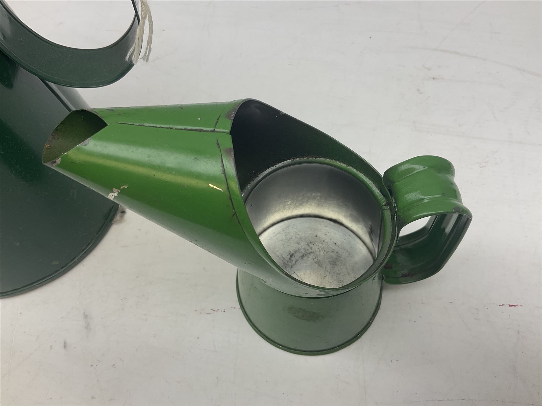 Bugatti cast iron sign with a red background, Shell Oil cast iron sign with gold background, together with Land Rover oil can, motorist warning lamp & torch tool kit and other motoring items 