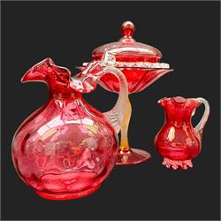 Jack in the Pulpit vase, with a Vaseline rim, together with a collection of cranberry glass, including enameled jars 