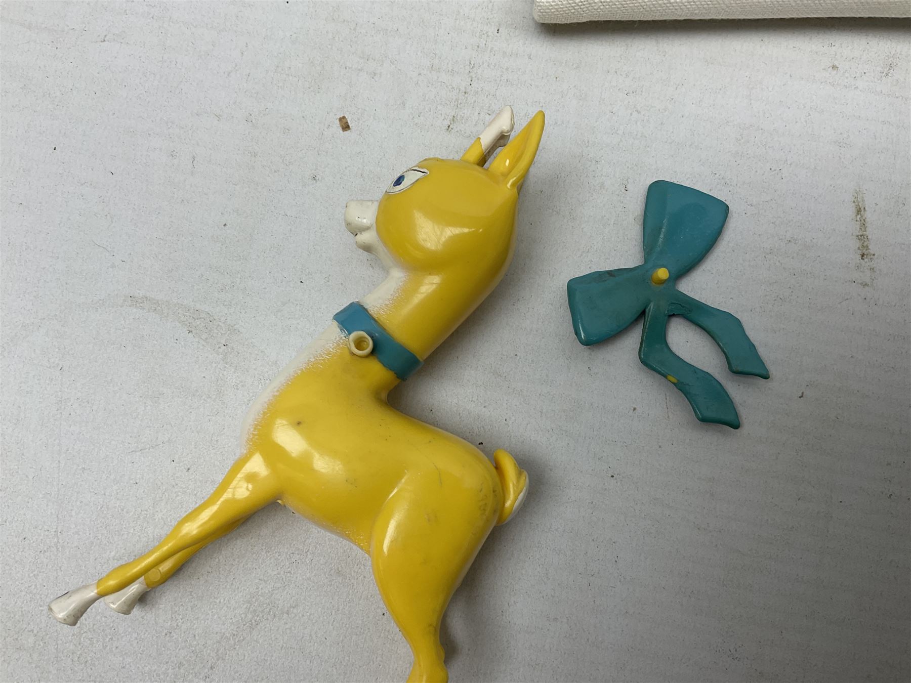 Breweriana; Eight Babycham glasses together with a Babycham plastic fawn mascot and linen I'd Love a Babycham tea towel