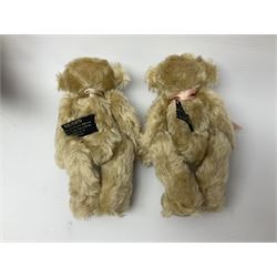 Group of five teddy bears comprising ‘George’ a unique pellet filled bear with glass eyes and velvet paws H38cm, and ‘Abbey’ a luxury German plush with wobble head and glass eyes no.5/10 H24cm, both with Teddies from Bearyland labels; along with two light blonde mohair H. M. Bears and Boyds Bears ‘T. F. Wuzzies’ no. 595140 (5)