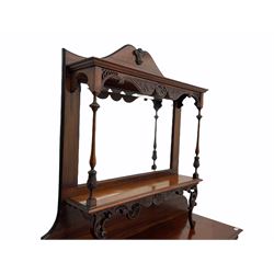Late Victorian Empire style walnut mirror back sideboard, two glazed centre cupboards with drawer drawer