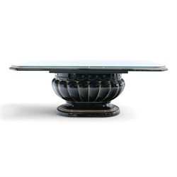 Italian Neoclassical inspired ebonised gloss coffee table, glazed cantered top with Greek key banding, on a shaped pedestal base with gilt highlights and stepped plinth 