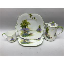 Aynsley Bluebell Time 'As Supplied to the Queen' tea service, comprising hot water jug, six teacups and saucers, milk jug, two cake plates and tow trinket dishes  