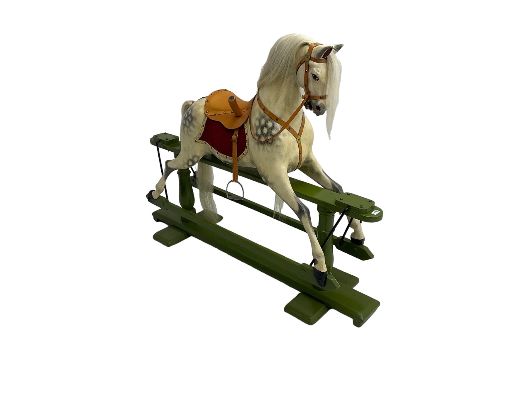 Attributed to F. H. Ayres - early 20th century carved wooden dapple grey rocking horse, with leather saddle and tack, with glass eyes, on green painted trestle base with turned column supports