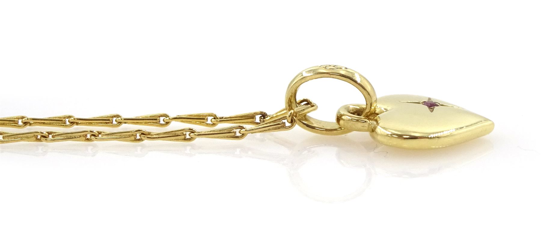 Links of London 18ct gold heart pendant, set with a single ruby, on 18ct gold fancy link chain necklace, both hallmarked