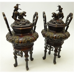  Pair 20th century Japanese bronze Koro and covers, relief decorated bulbous body, pierced covers with Dog of Fo finials on four tall cabriole legs, H29cm (2)  