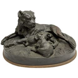 After W. Wolfe; bronze cast figural group depicting bullmastiff feeding puppies, signed with impressed mark to the front, on oval wooden base, H20cm