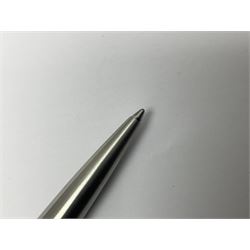 Three fountain pens, to include Conway Stewart 'Dinkie 550' and 'Conway 57' and a Parker 'Slimfold', all with 14ct gold nibs, together two roller ball pens, including a Parker example and a Swarovski Crystal paperweight