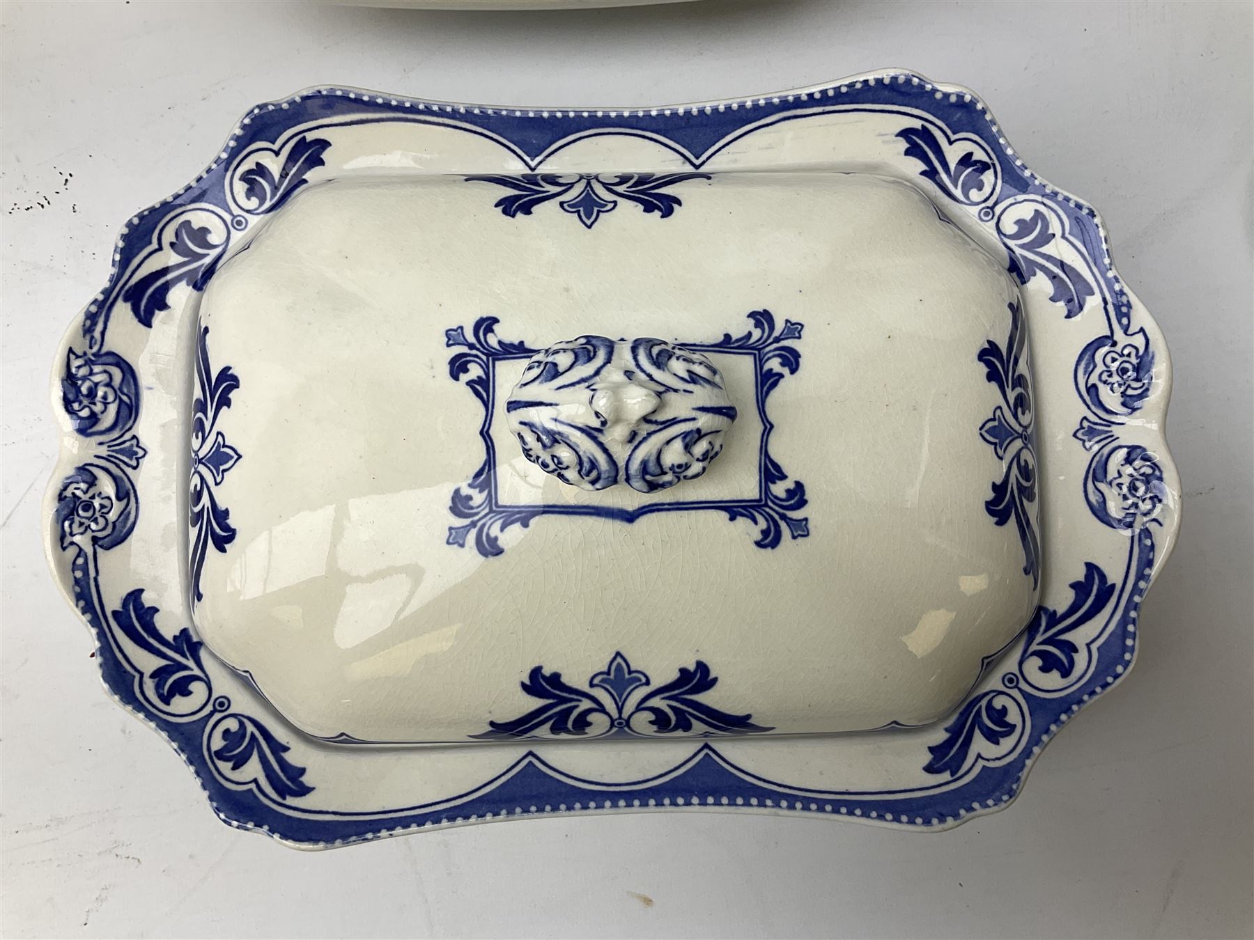 Burgess and Leigh Middleport pottery dinner wares decorated in the ‘Milford’ pattern, to include lidded tureens, graduated meat plates, dinner plates etc 