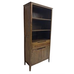 Hardwood bookcase, fitted with two open shelves over single drawer and double cupboard, retailed by Alexander Ellis of Beverley