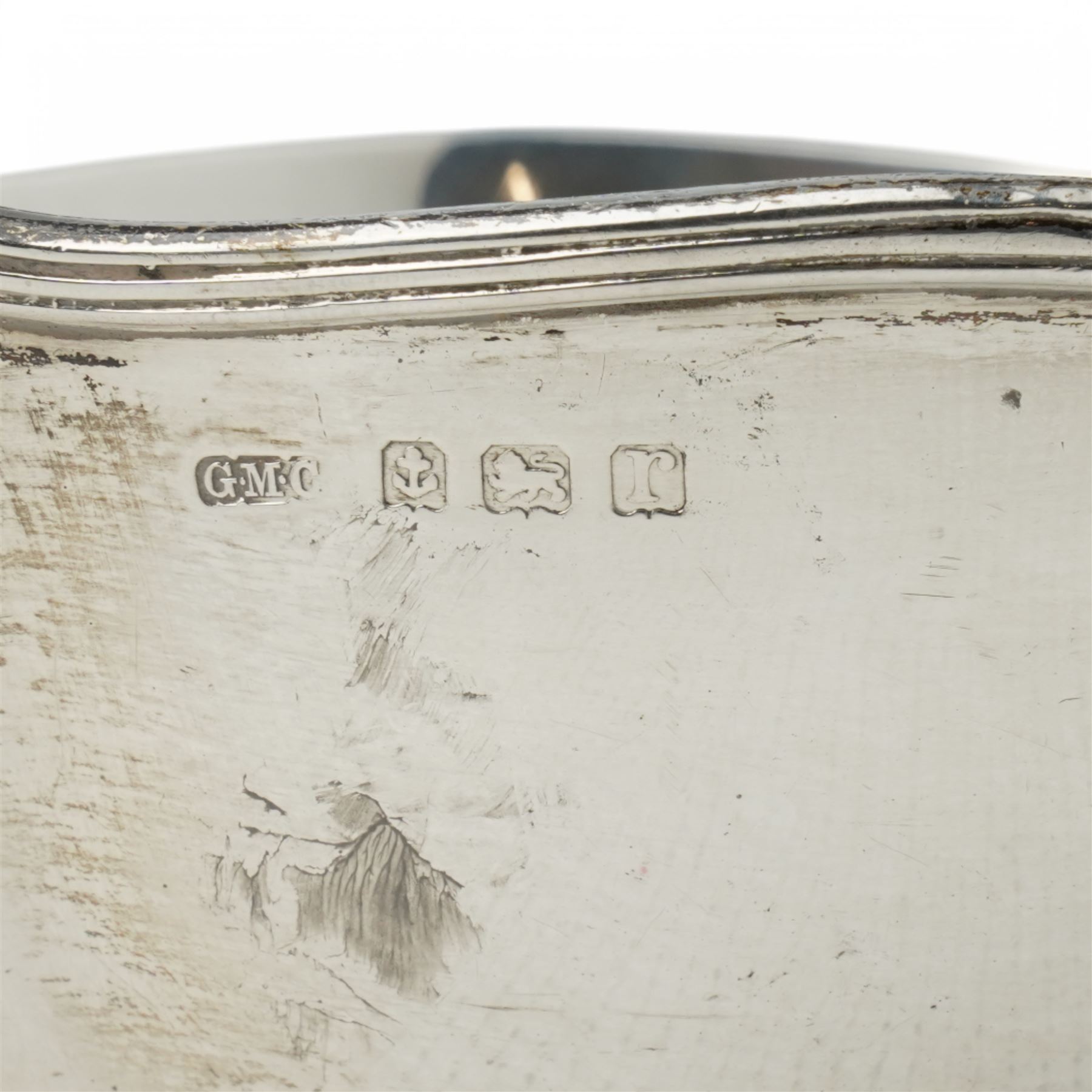 Pair of silver sauce boats with crimped reeded rims, angular handle and on pedestal foot Birmingham 1916 Maker Gorham Manufacturing Co.