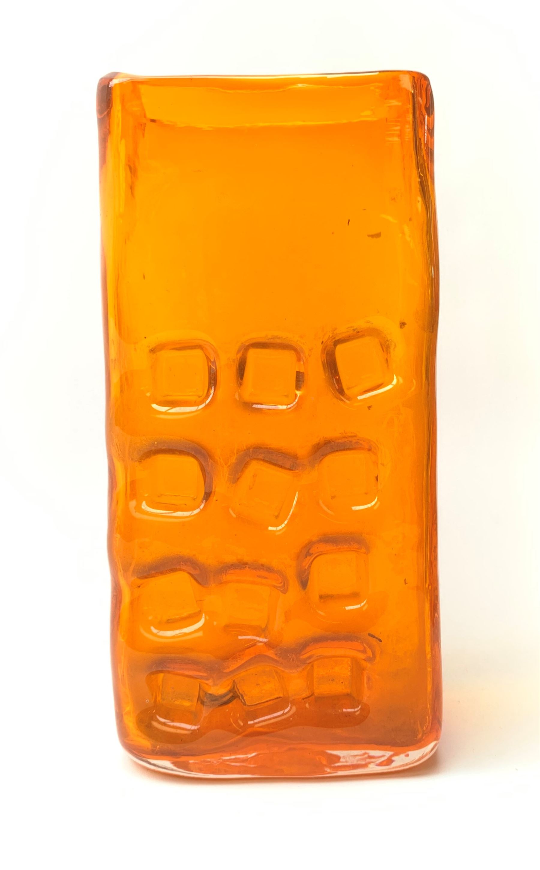 A large Whitefriars tangerine glass Nuts and Bolts vase, with textured finish twelve non-uniform squares to one side, H27cm 