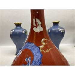 20th Century Japanese vase decorated with a blue dragon and gilding upon red yellow ground, bears Fukagawa Seiji mark (a/f), together with pair of blue cloisonné vases of baluster form decorated with blossom, and pair of Japanese vases, tallest H26cm