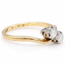 18ct gold diamond ring, crossover set with two round brilliant cut diamonds, Birmingham 1966, total diamond weight approx 0.30 carat