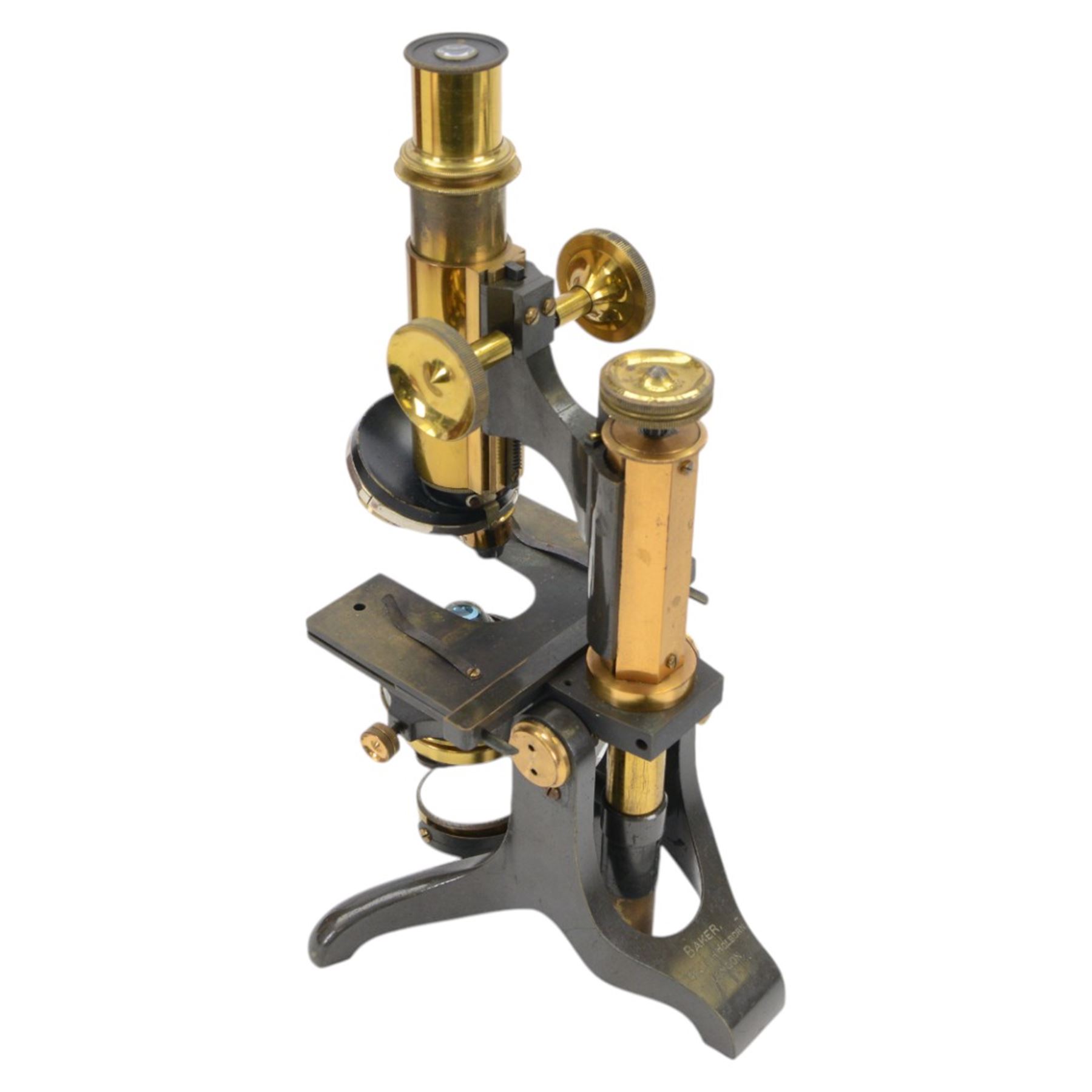 Early 20th century brass microscope, with black lacquer finish by C. E Baker of High Holborn, with lenses and plates contained within a wooden case, together with a collection of prepared microscope slides of predominantly histological and botanical specimens, contained within a wooden case