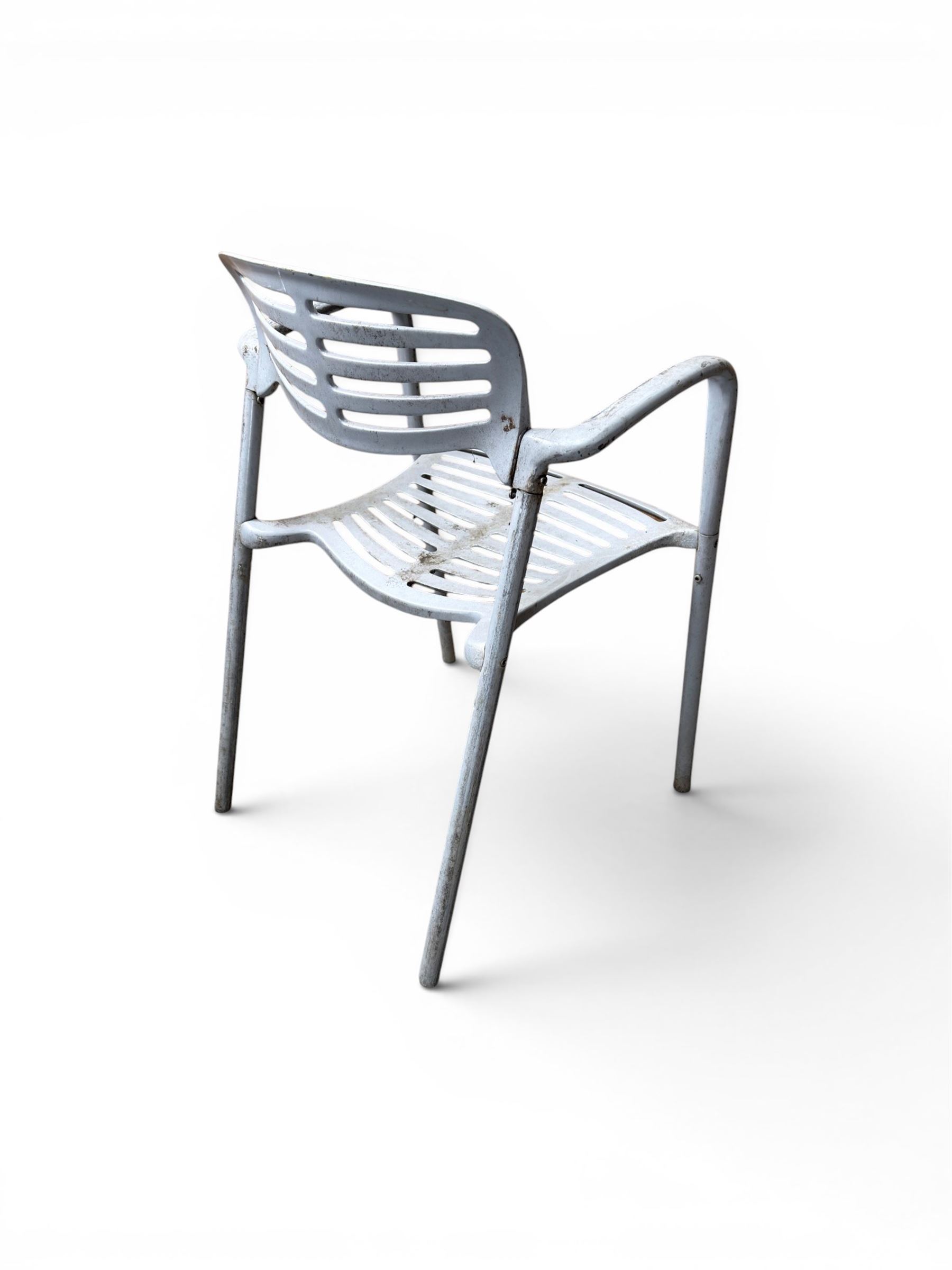 Set of eight mid-20th century painted aluminium garden armchairs, curved backs with shaped seat, stackable