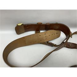 British Army General Staff officer's peaked cap by Herbert Johnson London in Moss Bros. delivery box; two officer's Sam Browne leather belts; leather pistol holster and sword hanger; pair of leather gloves and pair of spurs