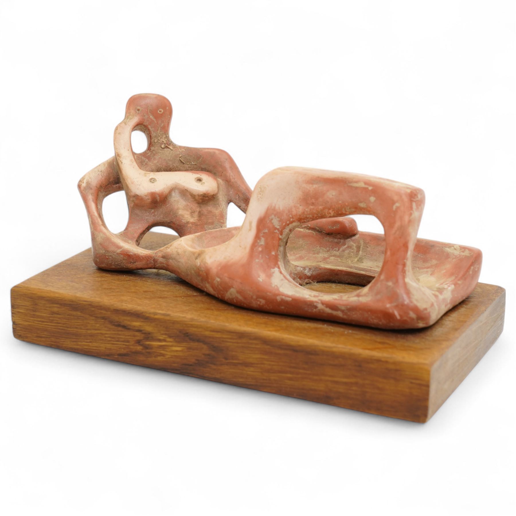After Henry Moore (British 1898-1986): 'Reclining Figure', terracotta maquette sculpture, base marked with affixed catalogue label inscribed 'Reclining Figure: 1945 Archive 0048398', W19cm H9.5cm
