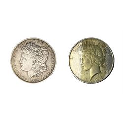 USA Morgan Dollar, and a 1925 Peace Dollar, (2)
