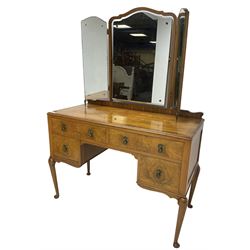 Early 20th century walnut dressing table, raised triple mirror back, over rectangular crossbanded top, fitted with four drawers, on cabriole supports