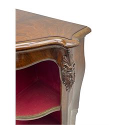 19th century rosewood buffet credenza, bombe form with shaped and moulded top, two central glazed doors with foliate moulded gilt slips, the red fabric-lined interior fitted with a single shelf, flanked by open shelves with raised gilt metal lips, the uprights decorated with shell and flower head carved cartouche mounts, acanthus leaf scroll carved lower mounts, on shaped and moulded plinth base 