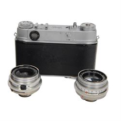 Kodak Retina III S camera outfit, comprising camera body serial no. 51394, three Schneider-Kreuznach lenses including Retina-Xenon f:1.9/50mm, Retina-Curtagon f:2.8/35mm and Retina-Tele-Arton f:4/85mm, viewfinder, close up rangefinder, filters and hood, contained within a brown Kodak carry case